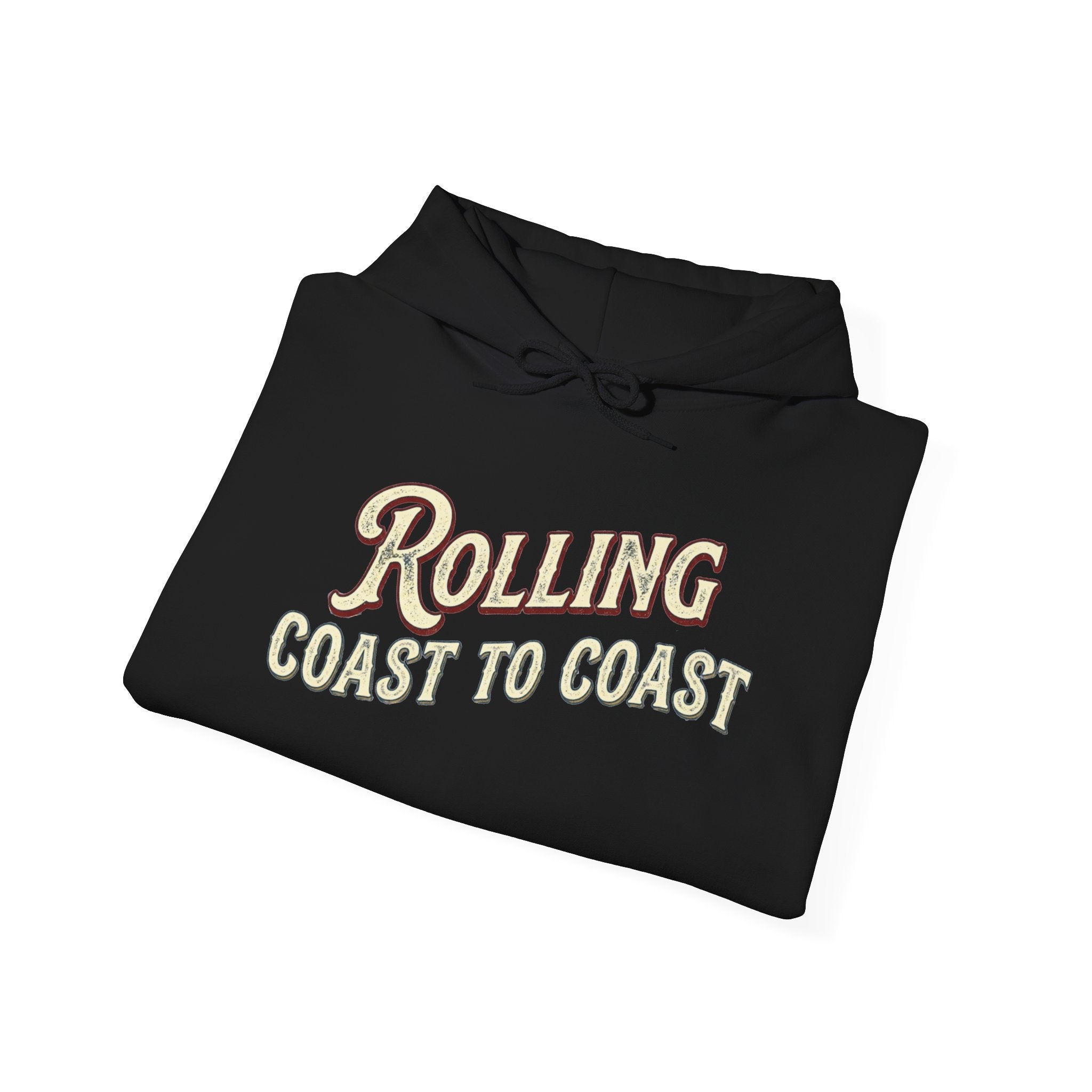 A folded black hoodie with 'Rolling Coast to Coast' printed on the front in a cream and red retro font, shown on a plain white background.