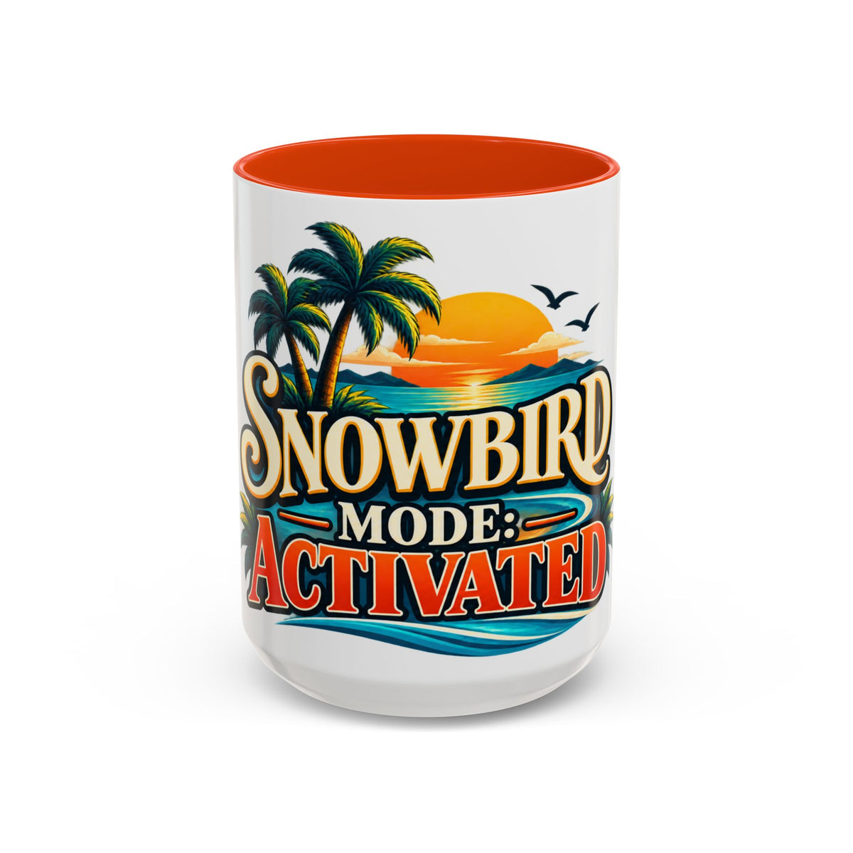 A white ceramic mug with a vibrant orange interior and a colorful tropical graphic on the side that reads 'SNOWBIRD MODE: ACTIVATED' with palm trees, a sunset, and waves.