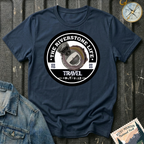 The Riverstone Life 2023 T-shirt by The Riverstone Life on a navy Gildan Softstyle 64000 featuring the official circular travel logo with a pickup truck and fifth-wheel RV.