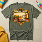 Truck Stop Cuisine Keeps Me Humble T-shirt by The Riverstone Life on a military green Gildan Softstyle 64000 featuring a vintage truck stop food graphic.
