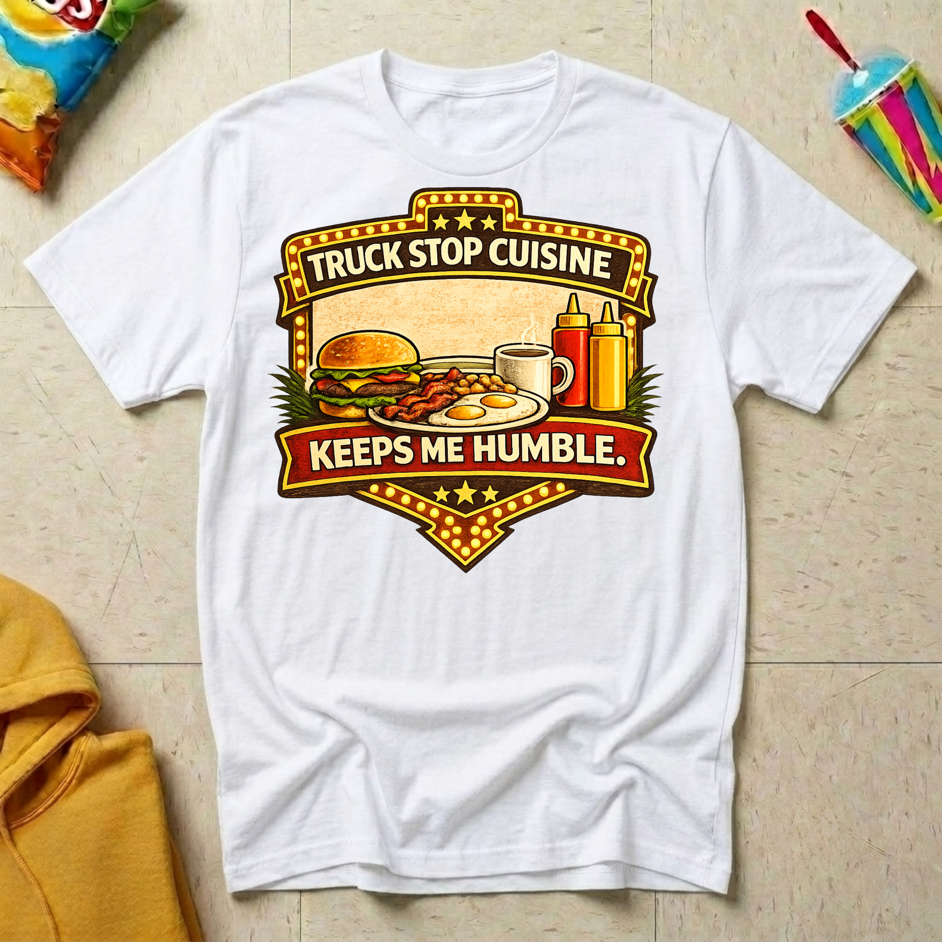 Truck Stop Cuisine Keeps Me Humble T-shirt by The Riverstone Life on white Gildan Softstyle 64000 featuring a vintage truck stop food graphic.