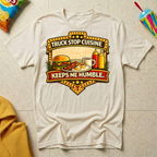 Truck Stop Cuisine Keeps Me Humble T-shirt by The Riverstone Life on a natural Gildan Softstyle 64000 featuring a vintage truck stop food graphic.