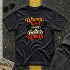 Wrong Turns Make Better Stories T-shirt by The Riverstone Life, a Gildan Softstyle 64000 black color featuring a colorful road and winding highway design for road trip enthusiasts and adventurous travelers.